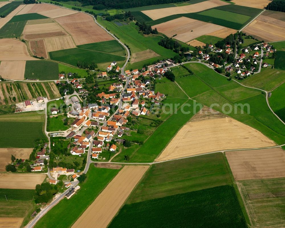 Aerial photograph Fürnheim - Agricultural land and field boundaries surround the settlement area of the village in Fürnheim in the state Bavaria, Germany