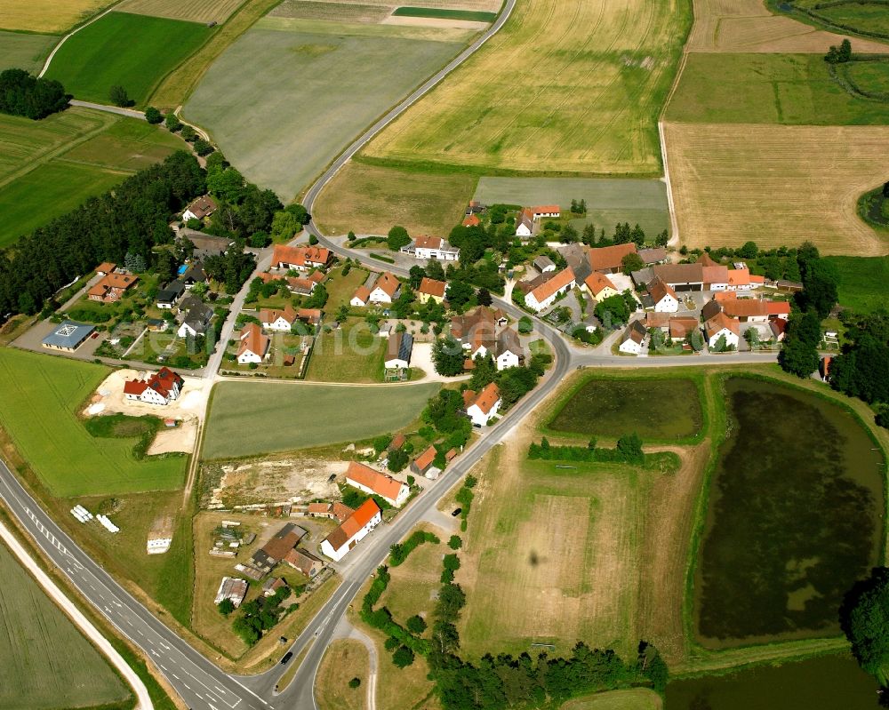 Fröschau from the bird's eye view: Agricultural land and field boundaries surround the settlement area of the village in Fröschau in the state Bavaria, Germany