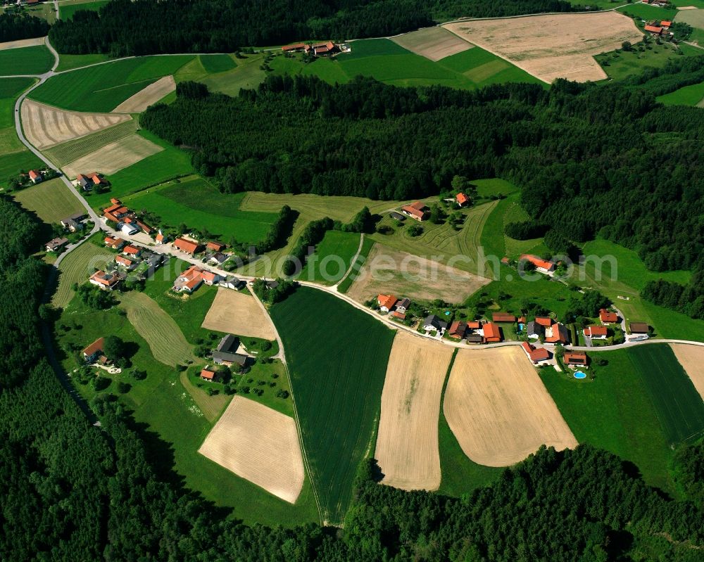 Aerial photograph Fürstberg - Agricultural land and field boundaries surround the settlement area of the village in Fürstberg in the state Bavaria, Germany