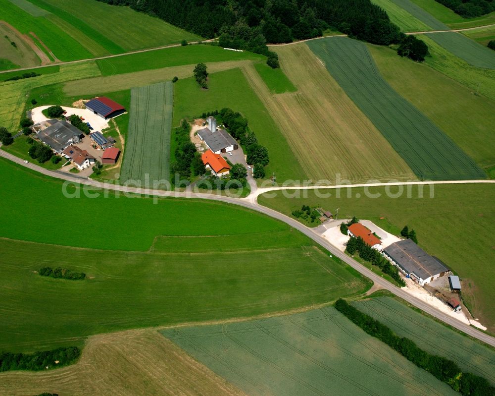 Gammertingen from the bird's eye view: Agricultural land and field boundaries surround the settlement area of the village in Gammertingen in the state Baden-Wuerttemberg, Germany