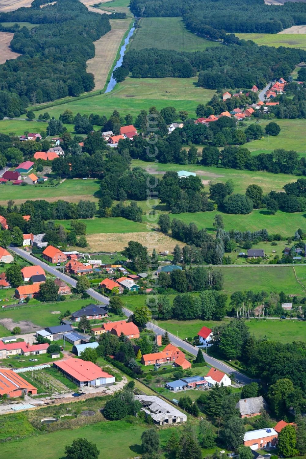 Garlitz from above - Agricultural land and field boundaries surround the settlement area of the village in Garlitz in the state Mecklenburg - Western Pomerania, Germany