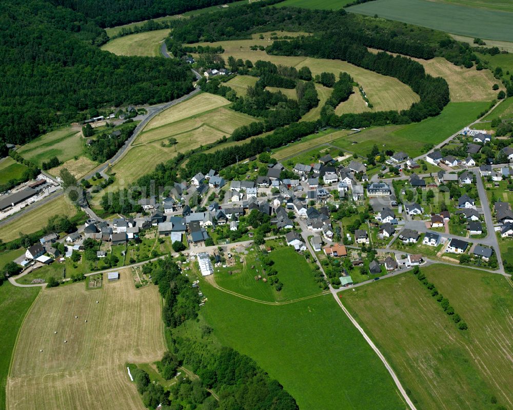 Gehlweiler from above - Agricultural land and field boundaries surround the settlement area of the village in Gehlweiler in the state Rhineland-Palatinate, Germany