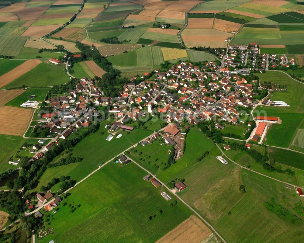 Aerial photograph Geilsheim - Agricultural land and field boundaries surround the settlement area of the village in Geilsheim in the state Bavaria, Germany