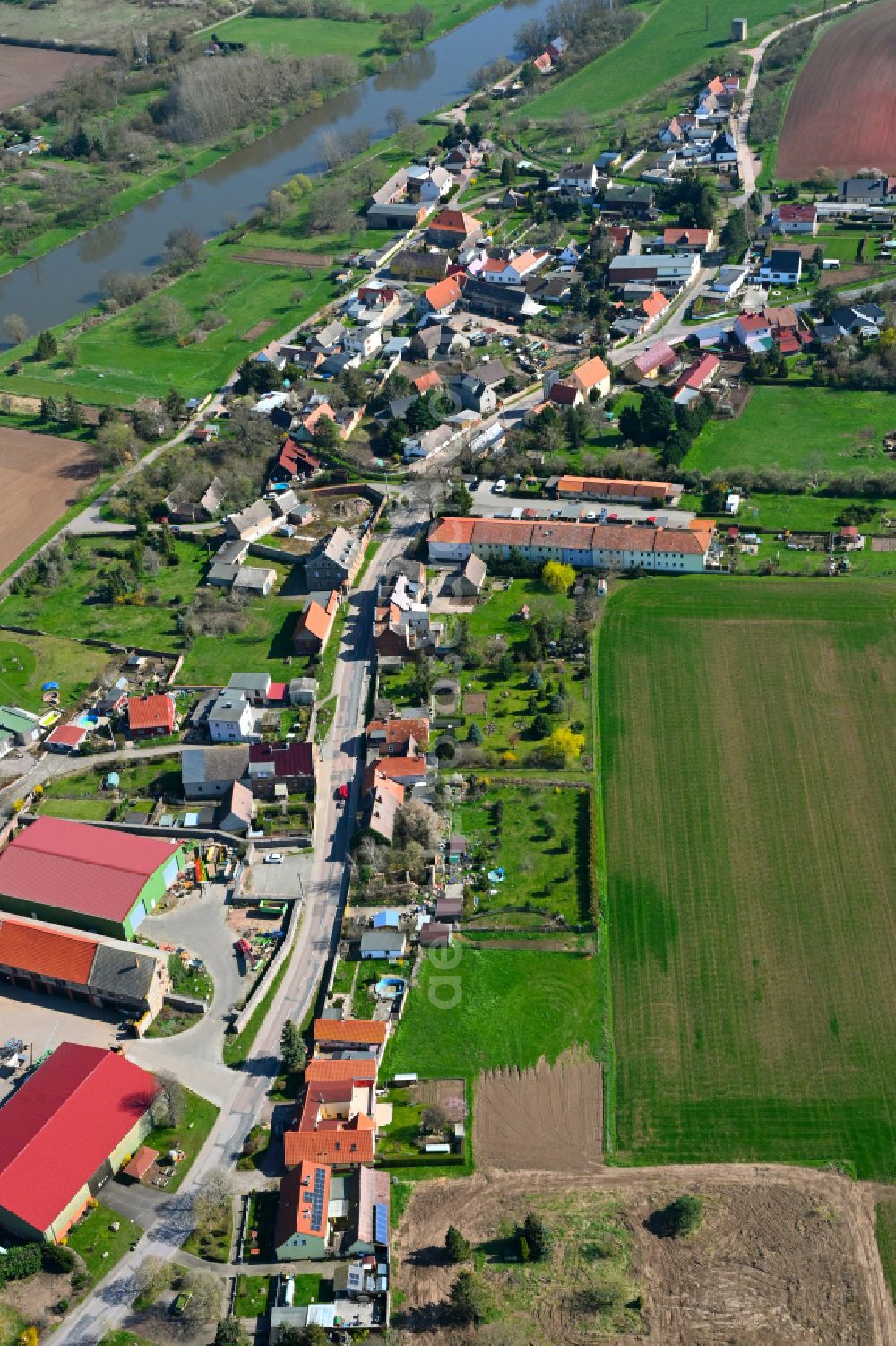 Georgsburg from above - Agricultural land and field boundaries surround the settlement area of the village in Georgsburg in the state Saxony-Anhalt, Germany