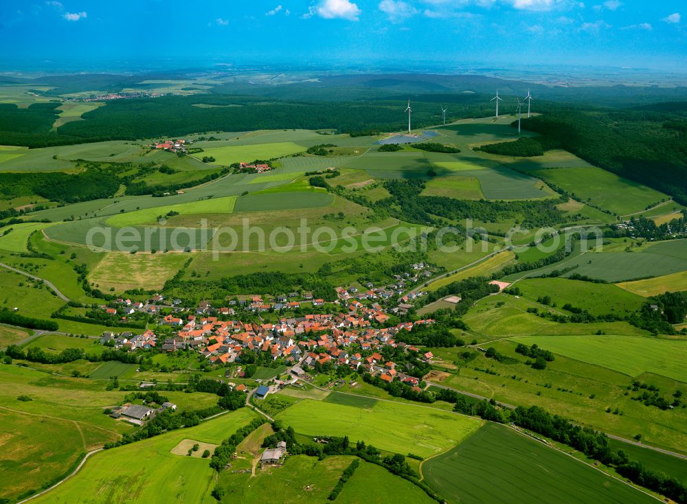 Gerbach from above - Agricultural land and field boundaries surround the settlement area of the village in Gerbach in the state Rhineland-Palatinate, Germany