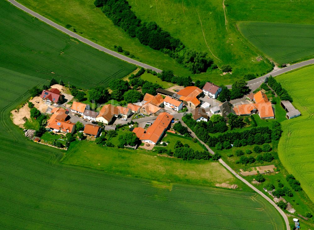 Gerbach from above - Agricultural land and field boundaries surround the settlement area of the village in Gerbach in the state Rhineland-Palatinate, Germany