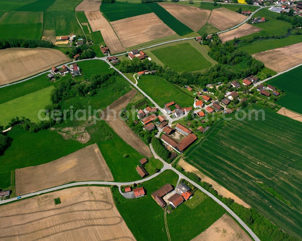 Aerial image Gerbersdorf - Agricultural land and field boundaries surround the settlement area of the village in Gerbersdorf in the state Bavaria, Germany