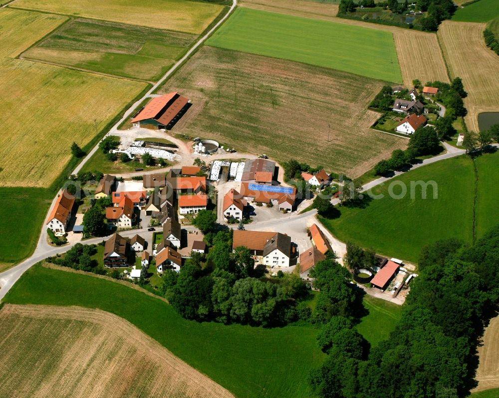 Aerial image Gerersdorf - Agricultural land and field boundaries surround the settlement area of the village in Gerersdorf in the state Bavaria, Germany