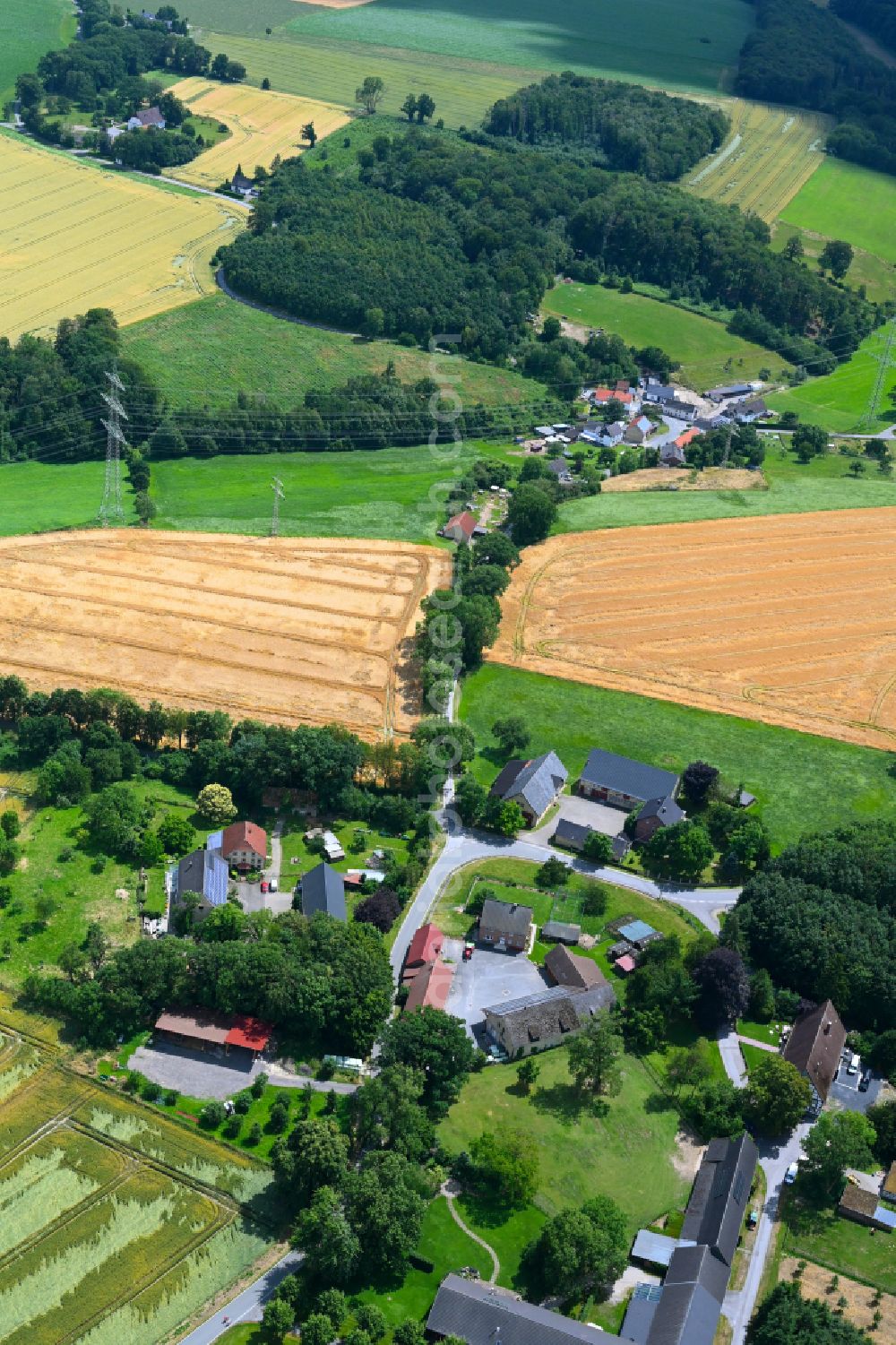 Aerial image Gerlingen - Agricultural land and field boundaries surround the settlement area of the village in Gerlingen Sauerland in the state North Rhine-Westphalia, Germany