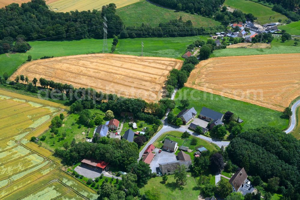 Aerial photograph Gerlingen - Agricultural land and field boundaries surround the settlement area of the village in Gerlingen Sauerland in the state North Rhine-Westphalia, Germany