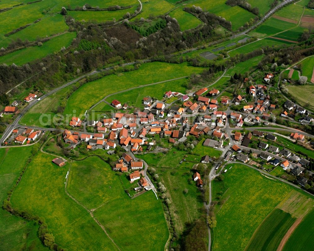 Aerial photograph Gittersdorf - Agricultural land and field boundaries surround the settlement area of the village in Gittersdorf in the state Hesse, Germany