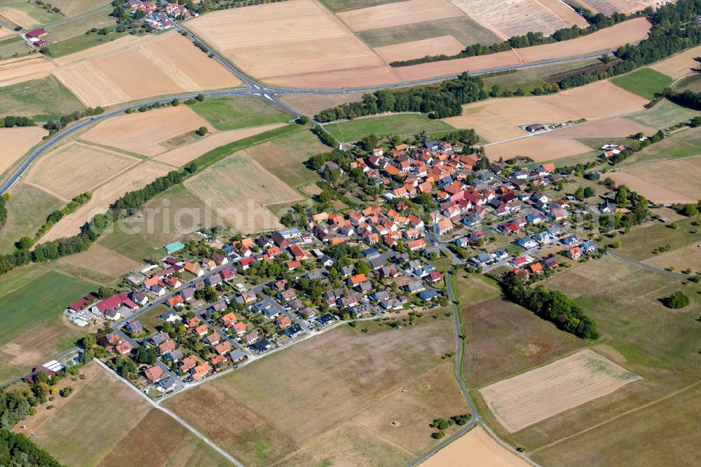 Glasofen from the bird's eye view: Agricultural land and field boundaries surround the settlement area of the village in Glasofen in the state Bavaria, Germany