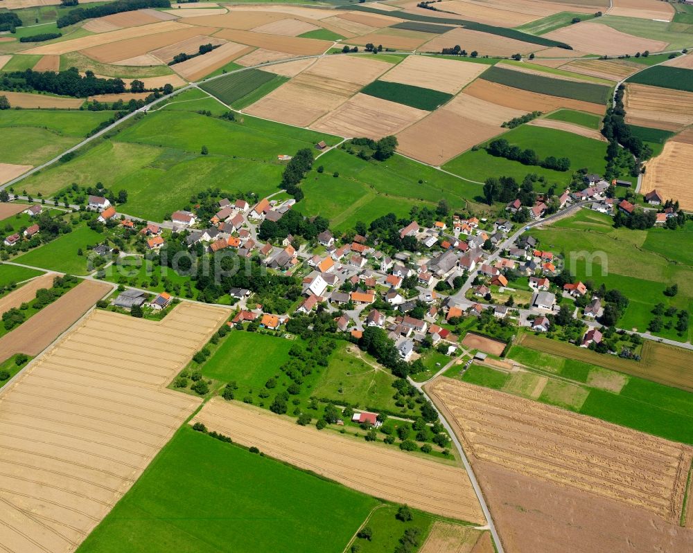 Aerial photograph Günzkofen - Agricultural land and field boundaries surround the settlement area of the village in Günzkofen in the state Baden-Wuerttemberg, Germany