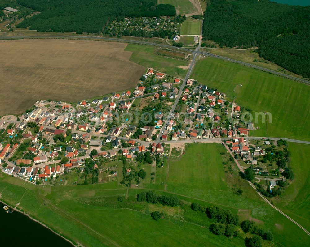 Aerial image Gohlis - Agricultural land and field boundaries surround the settlement area of the village in Gohlis in the state Saxony, Germany