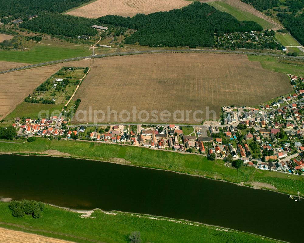 Aerial photograph Gohlis - Agricultural land and field boundaries surround the settlement area of the village in Gohlis in the state Saxony, Germany