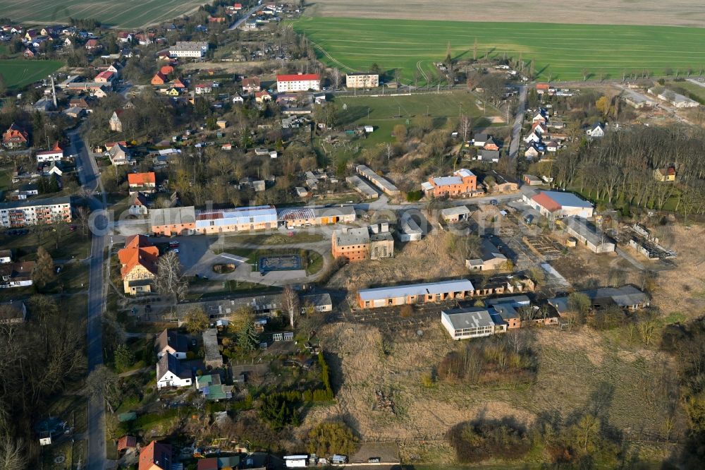 Aerial photograph Gollmitz - Agricultural land and field boundaries surround the settlement area of the village in Gollmitz in the state Brandenburg, Germany