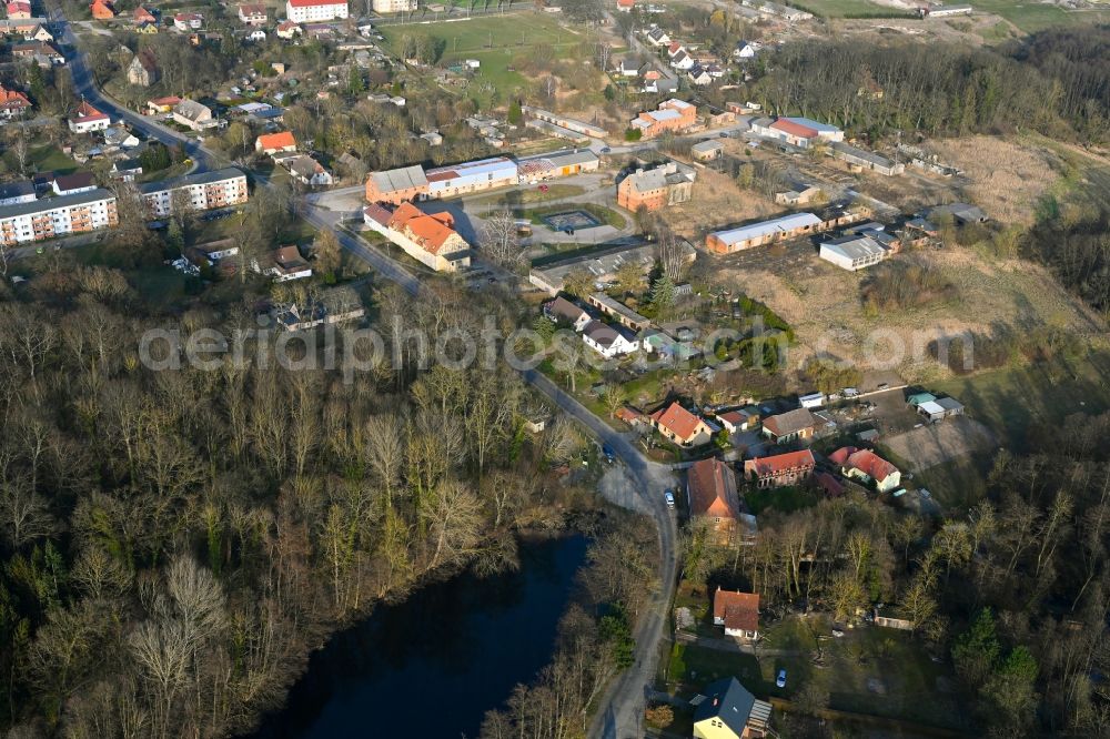 Aerial image Gollmitz - Agricultural land and field boundaries surround the settlement area of the village in Gollmitz in the state Brandenburg, Germany