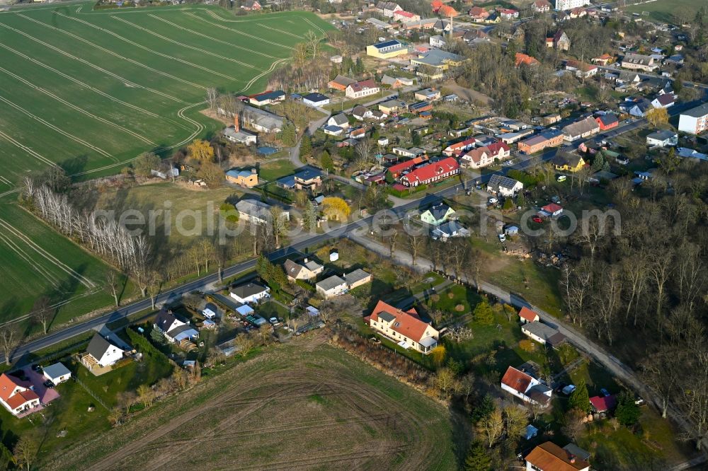 Aerial photograph Gollmitz - Agricultural land and field boundaries surround the settlement area of the village in Gollmitz in the state Brandenburg, Germany