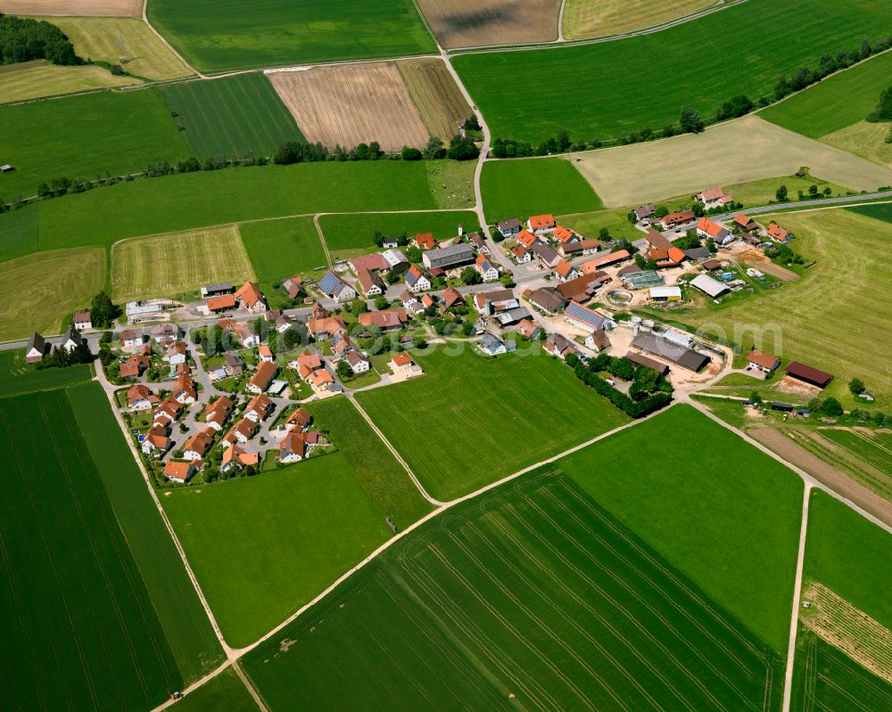 Goppertshofen from above - Agricultural land and field boundaries surround the settlement area of the village in Goppertshofen in the state Baden-Wuerttemberg, Germany