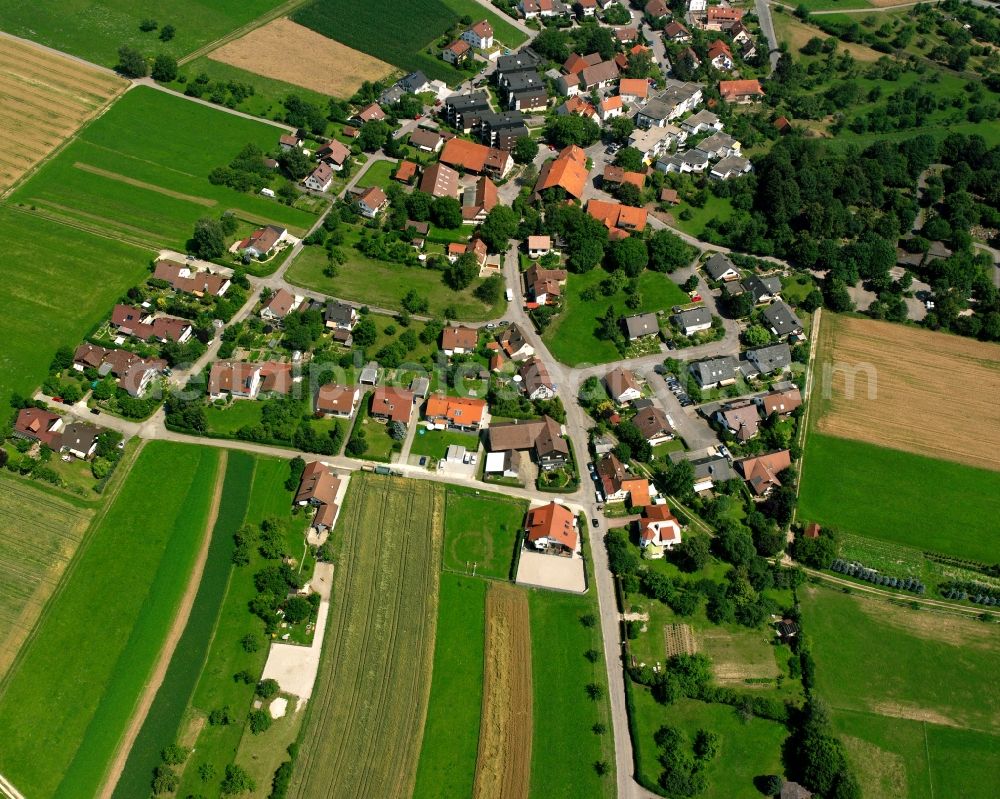 St Gotthardt from the bird's eye view: Agricultural land and field boundaries surround the settlement area of the village in St Gotthardt in the state Baden-Wuerttemberg, Germany