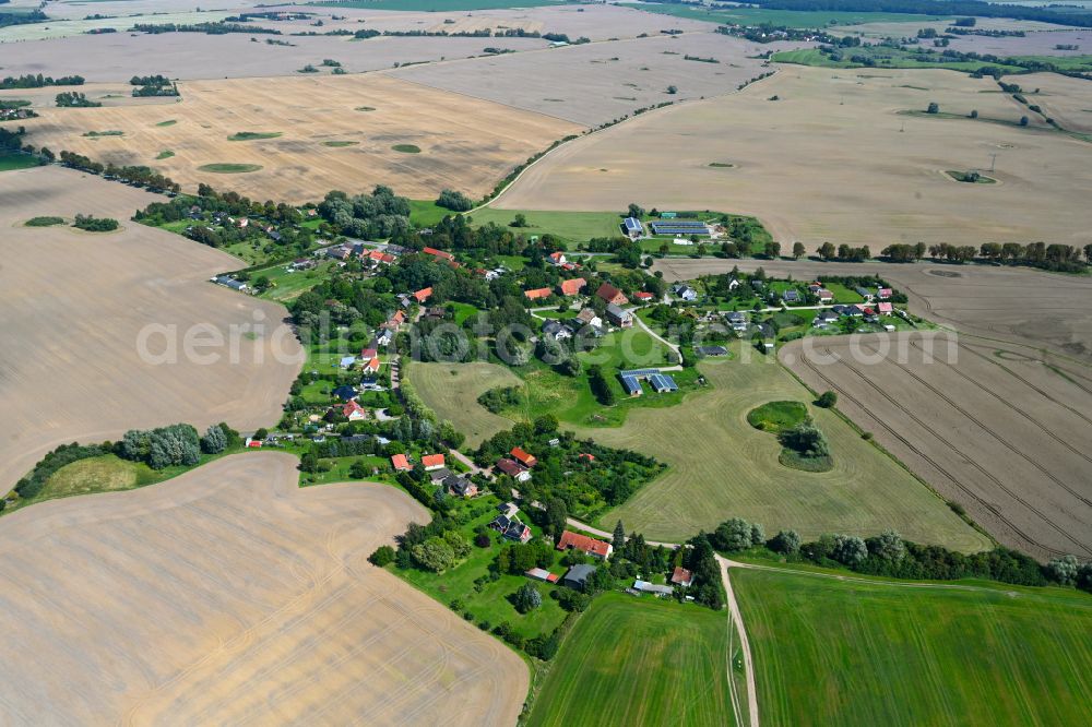 Aerial image Gramelow - Agricultural land and field boundaries surround the settlement area of the village in Gramelow in the state Mecklenburg - Western Pomerania, Germany