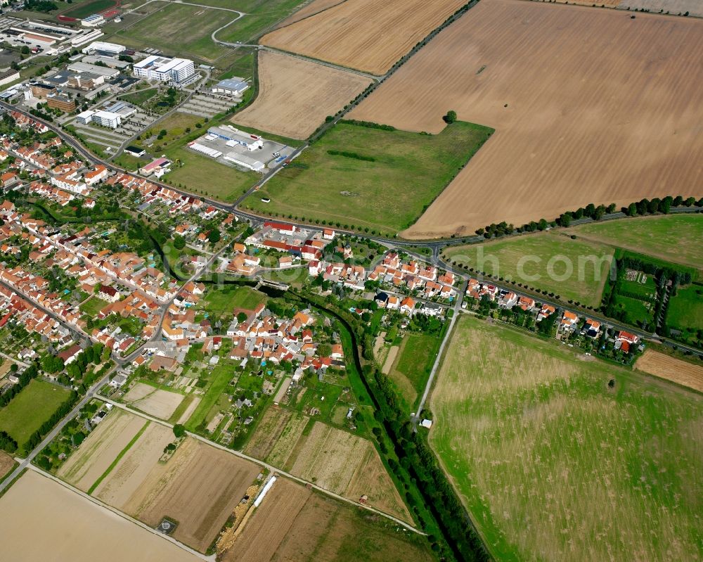 Aerial photograph Görmar - Agricultural land and field boundaries surround the settlement area of the village in Görmar in the state Thuringia, Germany