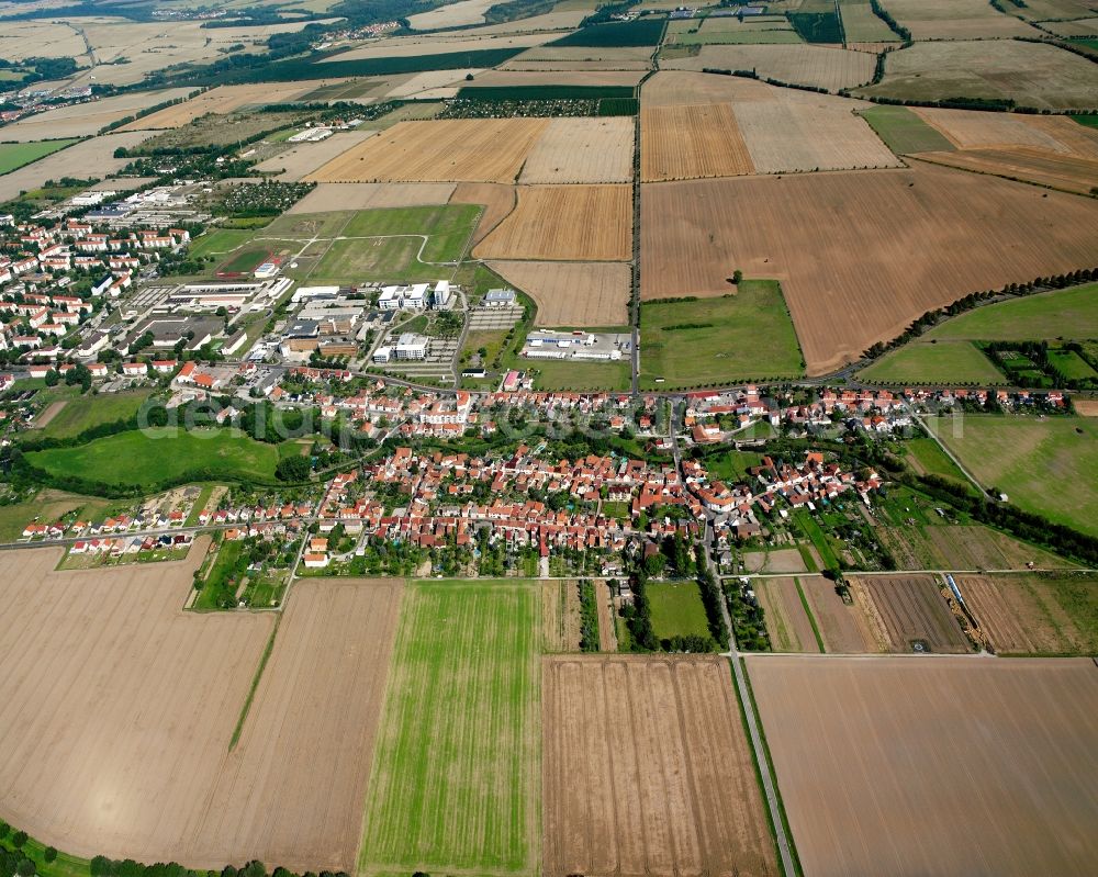 Görmar from above - Agricultural land and field boundaries surround the settlement area of the village in Görmar in the state Thuringia, Germany