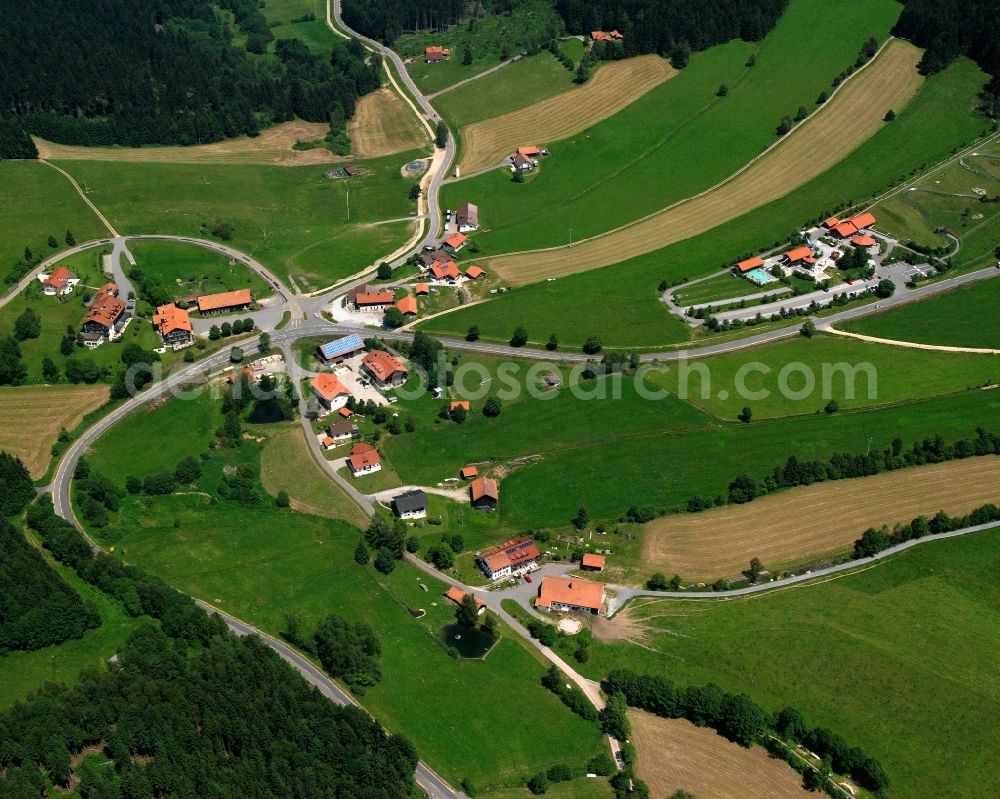 Grün from above - Agricultural land and field boundaries surround the settlement area of the village in Grün in the state Bavaria, Germany