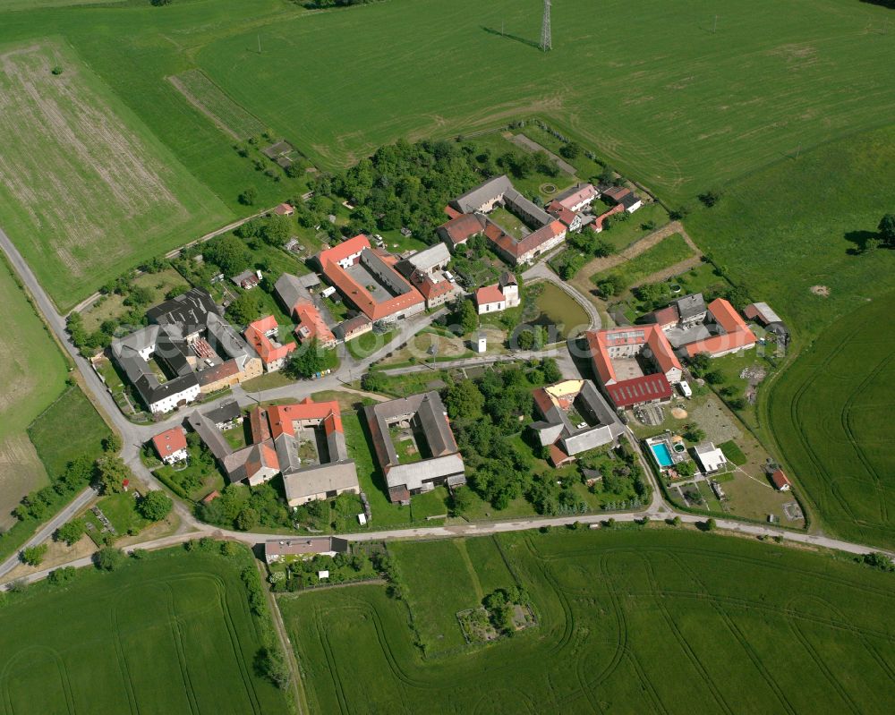 Grochwitz from the bird's eye view: Agricultural land and field boundaries surround the settlement area of the village in Grochwitz in the state Thuringia, Germany