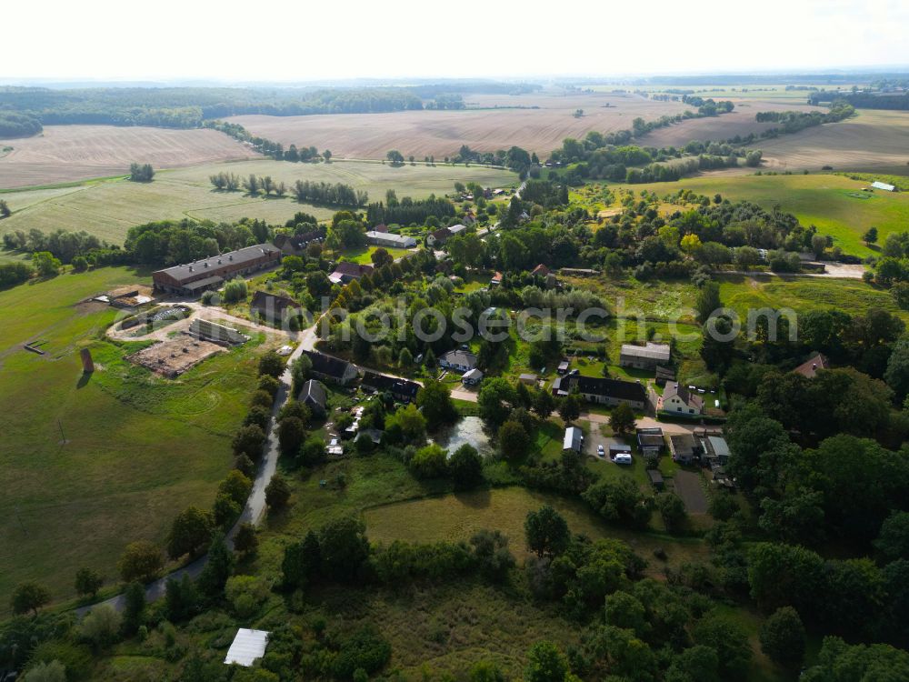 Groß Daberkow from the bird's eye view: Agricultural land and field boundaries surround the settlement area of the village in Gross Daberkow in the state Mecklenburg - Western Pomerania, Germany