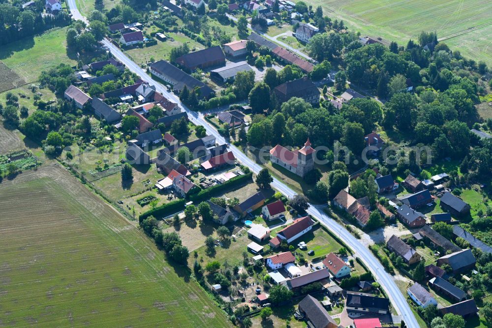 Aerial image Groß Jehser - Agricultural land and field boundaries surround the settlement area of the village on street Schmiedeweg in Gross Jehser in the state Brandenburg, Germany