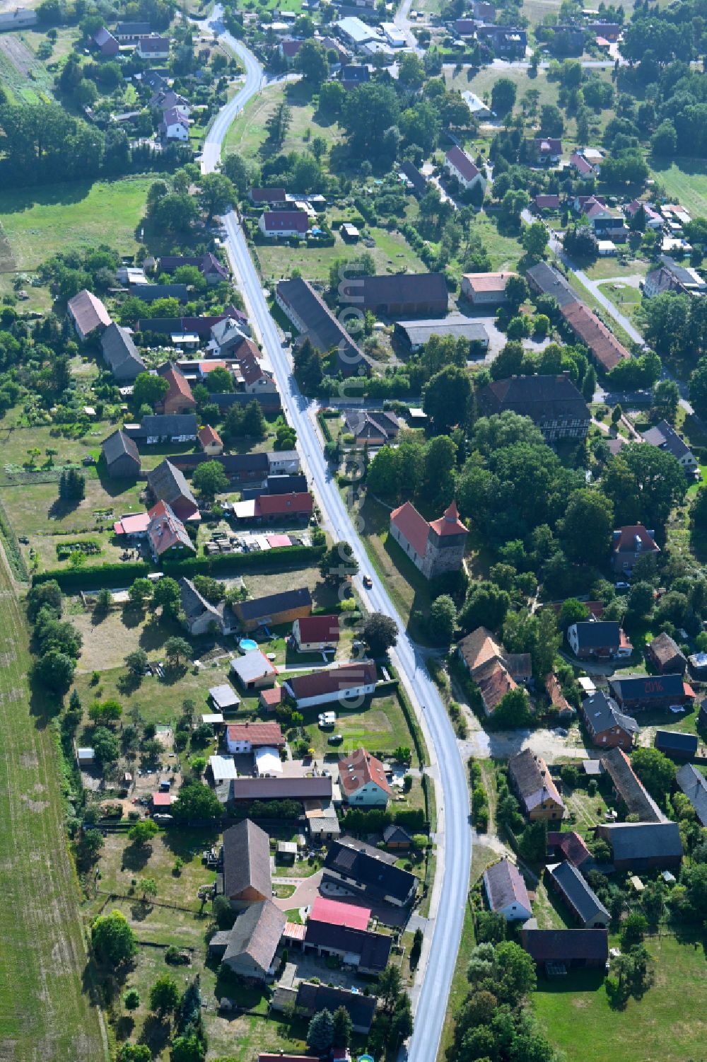 Aerial photograph Groß Jehser - Agricultural land and field boundaries surround the settlement area of the village on street Schmiedeweg in Gross Jehser in the state Brandenburg, Germany