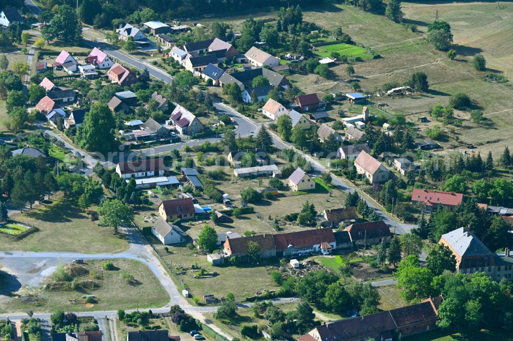 Groß Jehser from the bird's eye view: Agricultural land and field boundaries surround the settlement area of the village on street Schmiedeweg in Gross Jehser in the state Brandenburg, Germany