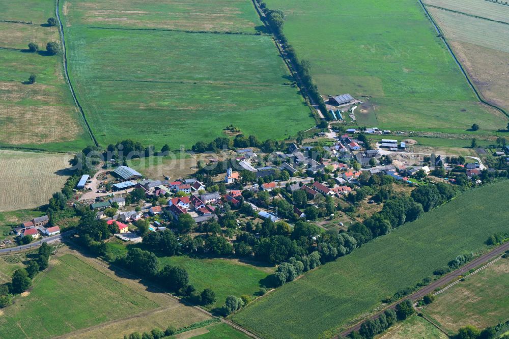 Groß Kreutz from above - Agricultural land and field boundaries surround the settlement area of the village in Groß Kreutz in the state Brandenburg, Germany