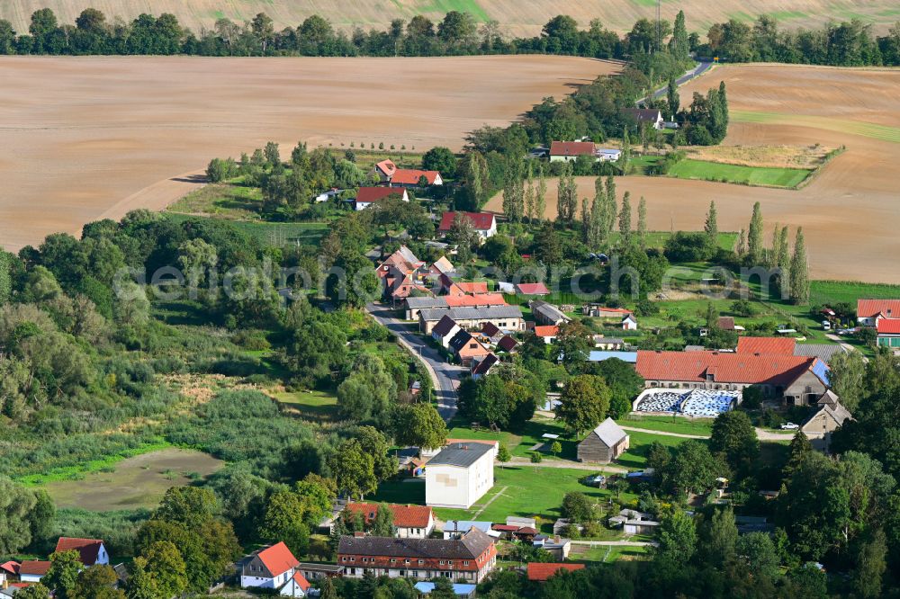 Groß Sperrenwalde from above - Agricultural land and field boundaries surround the settlement area of the village in Gross Sperrenwalde in the state Brandenburg, Germany