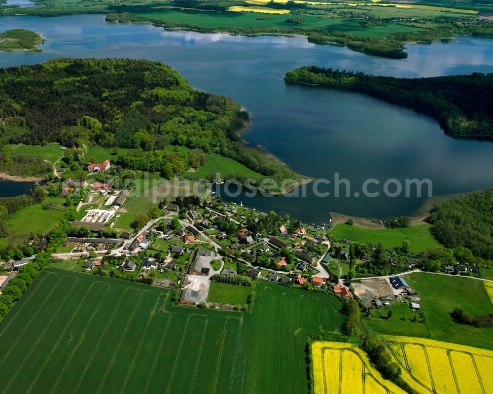 Groß Zecher from above - Agricultural land and field boundaries surround the settlement area of the village in Groß Zecher in the state Schleswig-Holstein, Germany