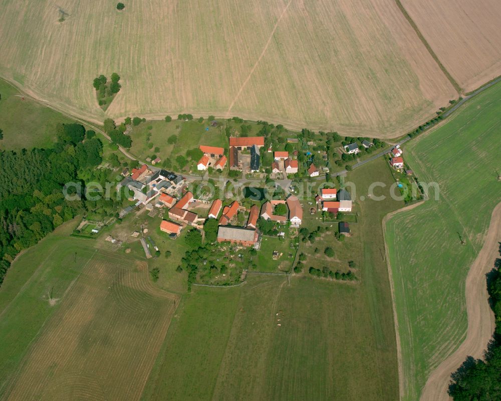 Großdraxdorf from above - Agricultural land and field boundaries surround the settlement area of the village in Großdraxdorf in the state Thuringia, Germany