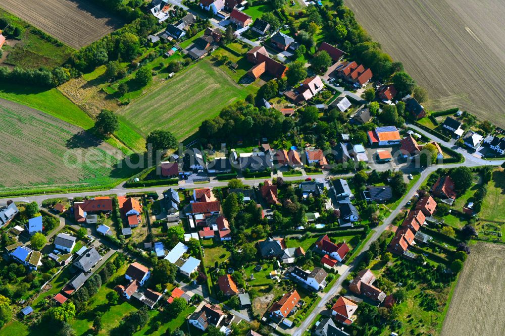 Aerial image Großenheide - Agricultural land and field boundaries surround the settlement area of the village in Grossenheide in the state North Rhine-Westphalia, Germany