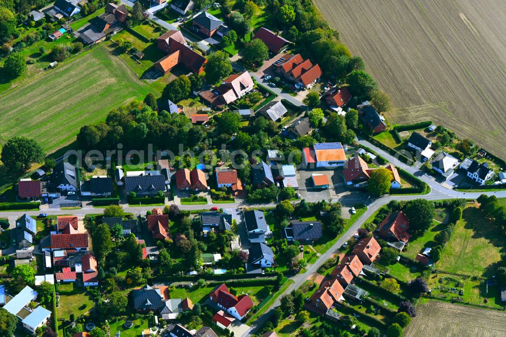 Aerial photograph Großenheide - Agricultural land and field boundaries surround the settlement area of the village in Grossenheide in the state North Rhine-Westphalia, Germany