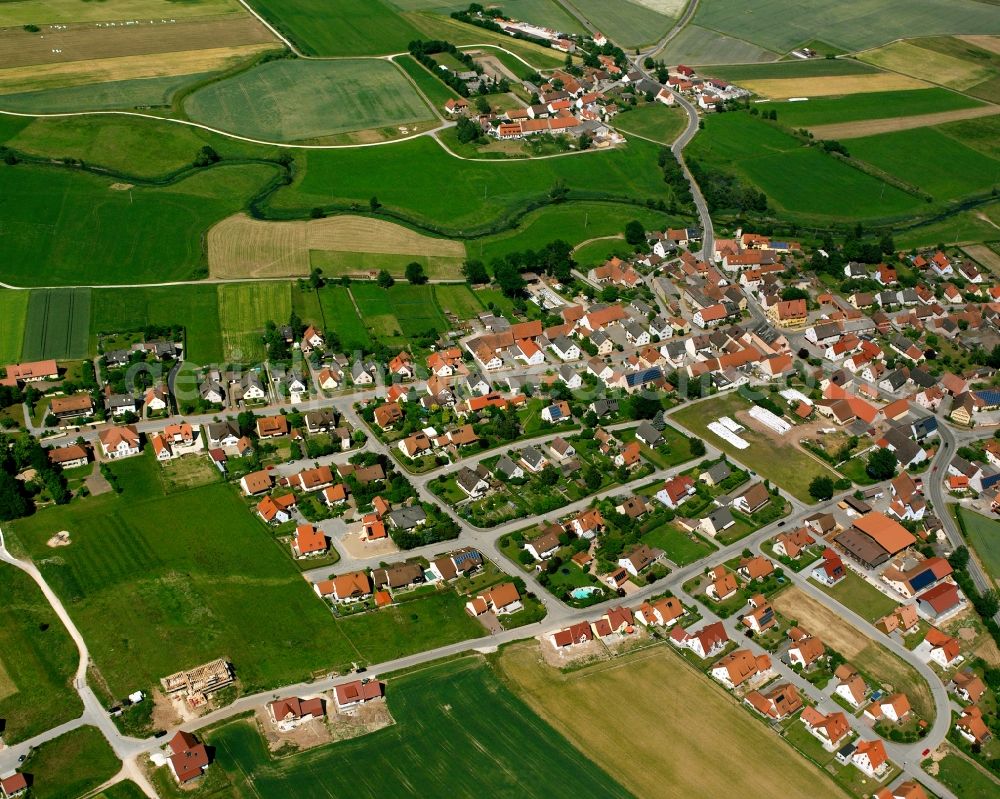 Großenried from the bird's eye view: Agricultural land and field boundaries surround the settlement area of the village in Großenried in the state Bavaria, Germany