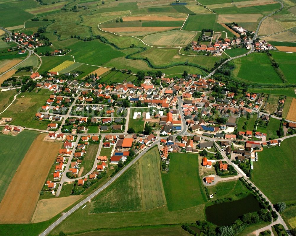 Großenried from the bird's eye view: Agricultural land and field boundaries surround the settlement area of the village in Großenried in the state Bavaria, Germany