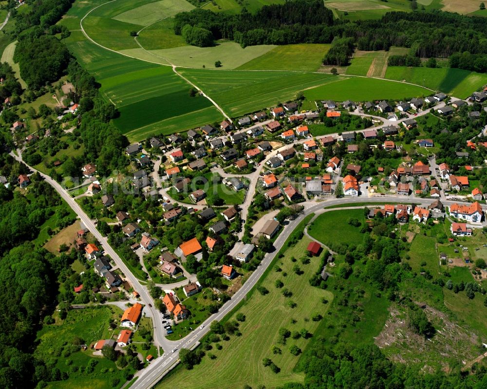 Aerial image Großerlach - Agricultural land and field boundaries surround the settlement area of the village in Großerlach in the state Baden-Wuerttemberg, Germany