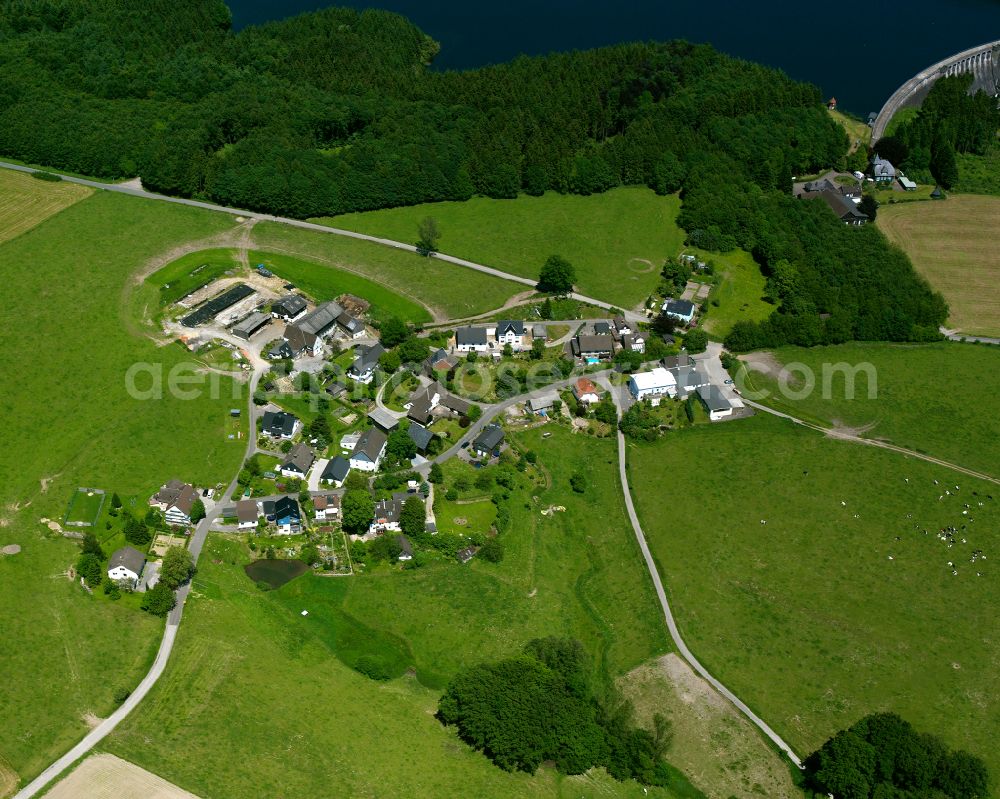 Aerial photograph Großfastenrath - Agricultural land and field boundaries surround the settlement area of the village in Großfastenrath in the state North Rhine-Westphalia, Germany