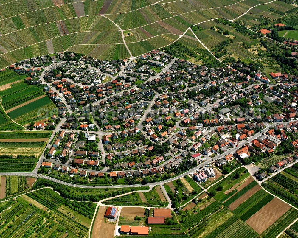 Großheppach from above - Agricultural land and field boundaries surround the settlement area of the village in Großheppach in the state Baden-Wuerttemberg, Germany