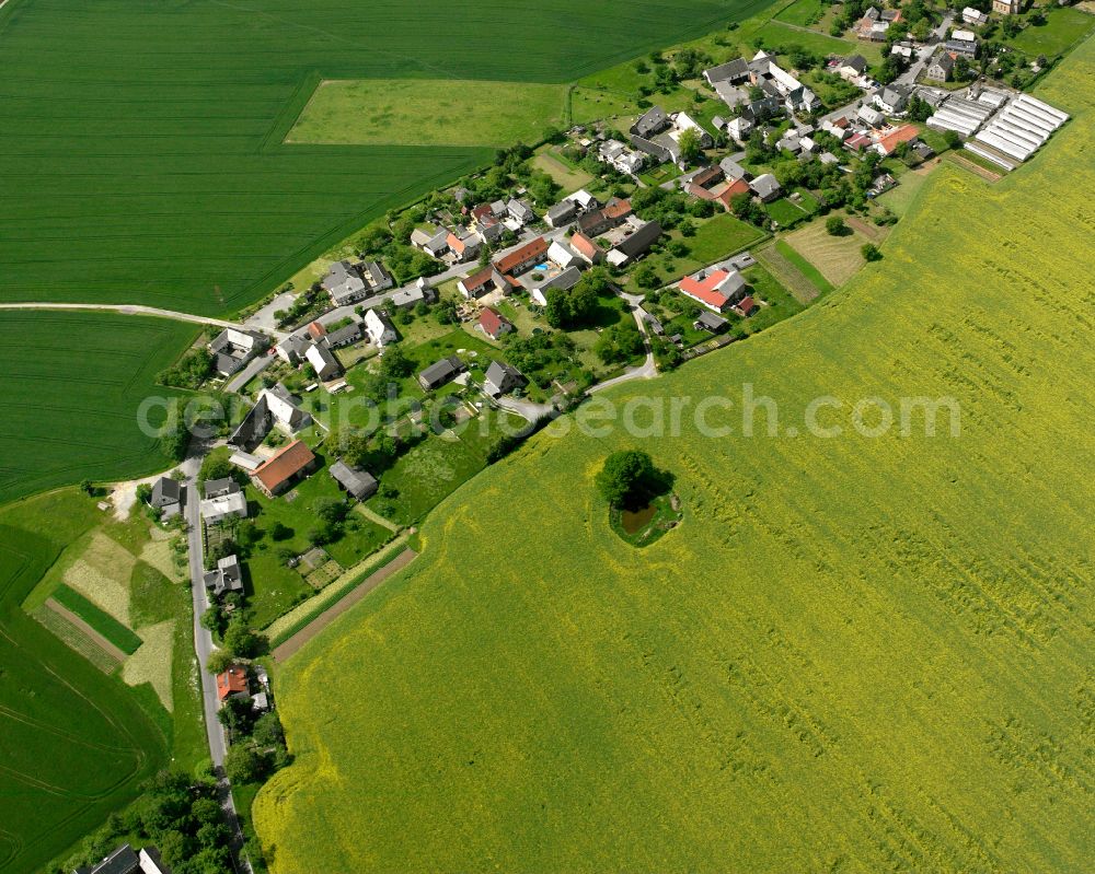 Aerial image Großkundorf - Agricultural land and field boundaries surround the settlement area of the village in Großkundorf in the state Thuringia, Germany