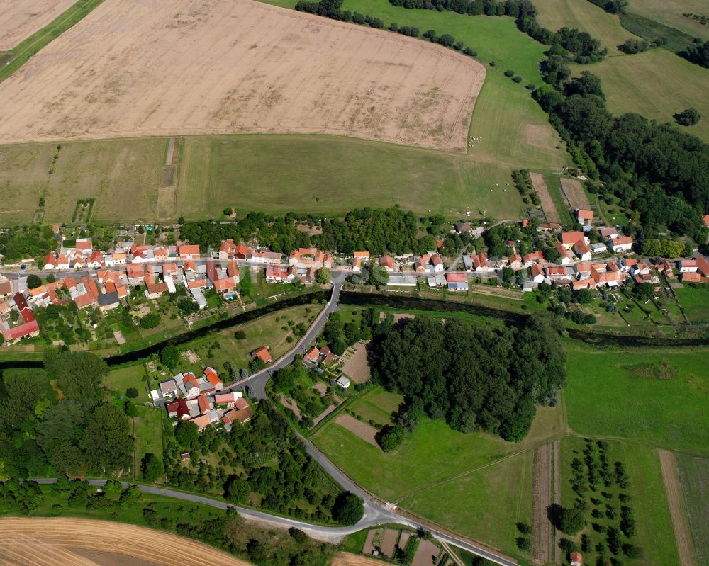 Großvargula from the bird's eye view: Agricultural land and field boundaries surround the settlement area of the village in Großvargula in the state Thuringia, Germany