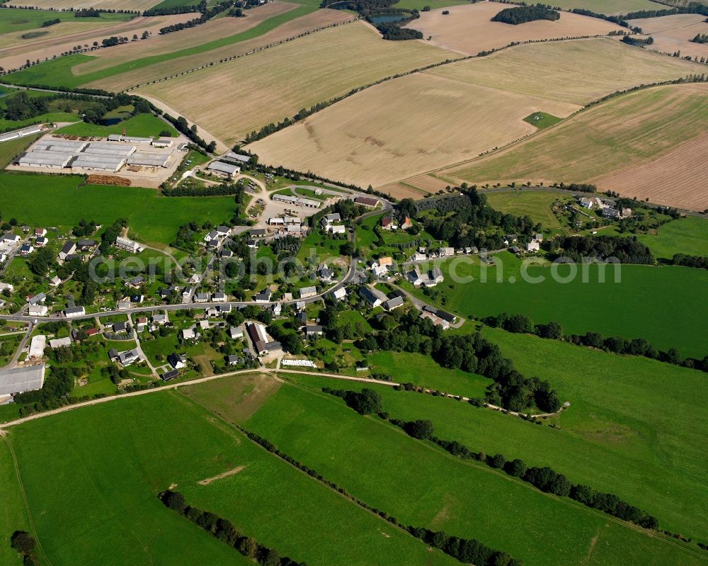 Aerial image Großwaltersdorf - Agricultural land and field boundaries surround the settlement area of the village in Großwaltersdorf in the state Saxony, Germany