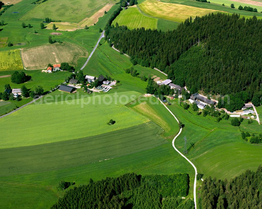 Grund from the bird's eye view: Agricultural land and field boundaries surround the settlement area of the village in Grund in the state Bavaria, Germany