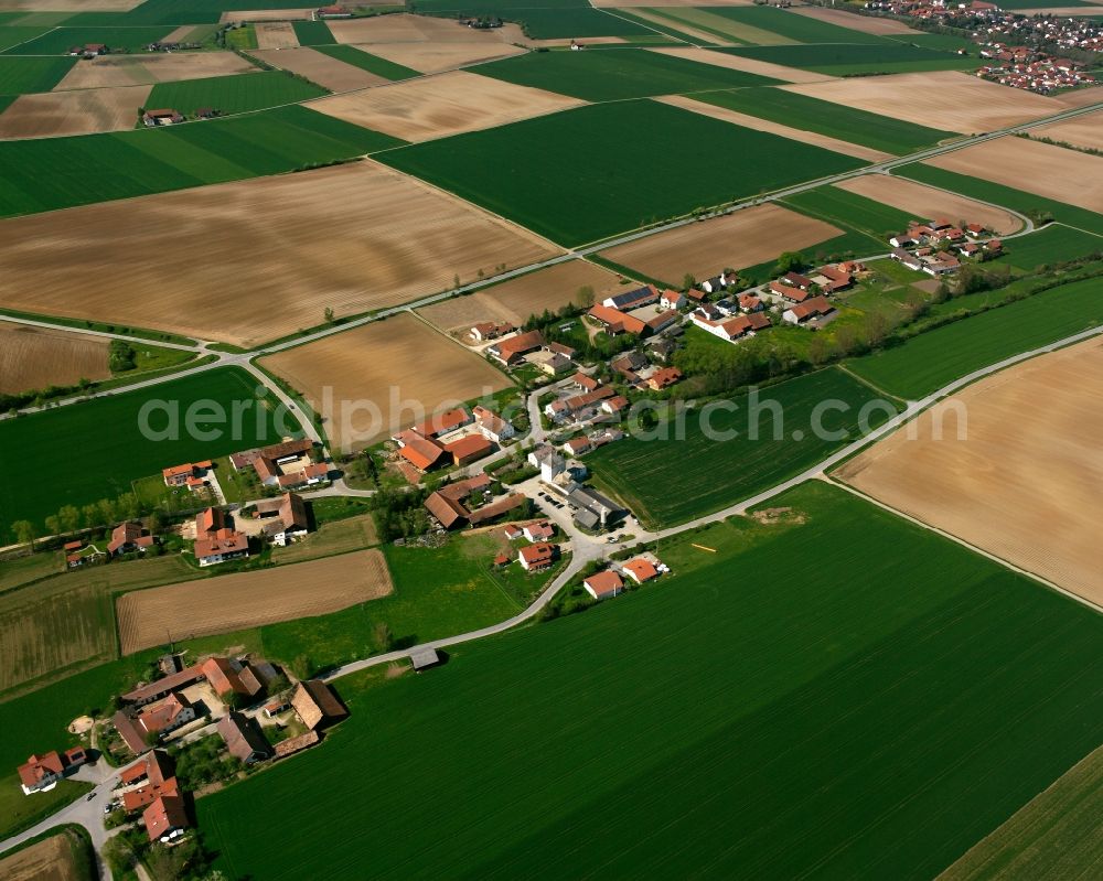 Aerial photograph Gundhöring - Agricultural land and field boundaries surround the settlement area of the village in Gundhöring in the state Bavaria, Germany