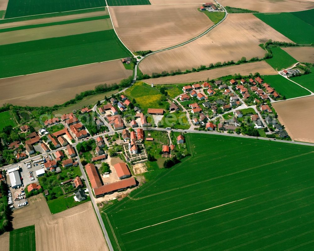 Aerial photograph Gundhöring - Agricultural land and field boundaries surround the settlement area of the village in Gundhöring in the state Bavaria, Germany